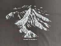 Black t-shirt with a white mountain graphic and text on a dark background